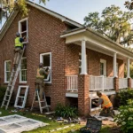 New vinyl windows on a brick home in summer sunlight